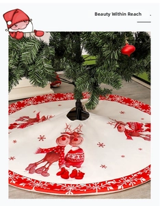 Detail view of 122cm Christmas tree skirt with reindeer and red snowflake patterns