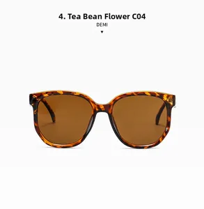 Détail de lunettes de soleil oversize tendance avec monture écaillée et verres marrons