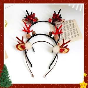 Three-piece Christmas reindeer antler headbands with plush balls and festive berry details