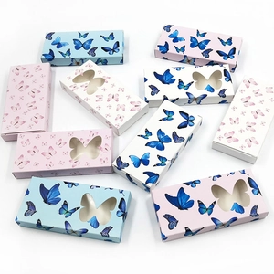 Various butterfly eyelash boxes in pink, blue, and white with heart-shaped window details