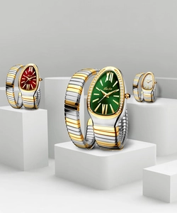 Detailed view of luxury snake-shaped watches with crystal bezels and steel tubogas bands