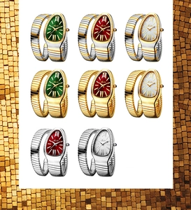 Macro display of snake-shaped wrap watches with rhinestone bezels in various metal finishes