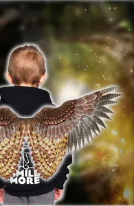 Detailed back view of kids owl wings costume with feather pattern on starry background