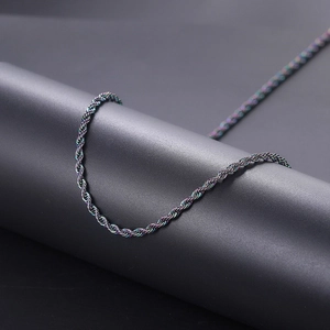 Macro view of 3mm rainbow stainless steel twisted rope chain with vibrant metallic finish