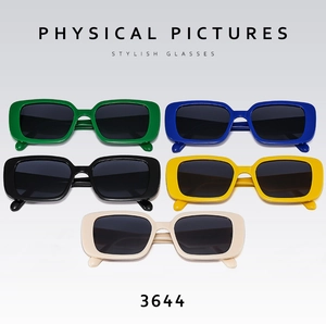 Flat lay display of retro rectangular sunglasses in five vibrant colors with UV lenses