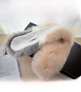 Detail of grey and beige faux fox fur scarf with clip, size 70x15cm for winter warmth