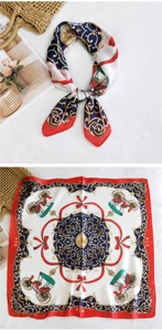 Detail of silk square scarf featuring vintage carriage print and satin texture finish