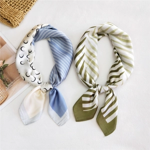 Elegant set of two silk-like scarves featuring blue crescent and green stripe patterns