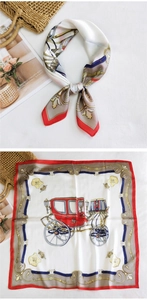 Detail of elegant satin square scarf featuring vintage carriage print and red border