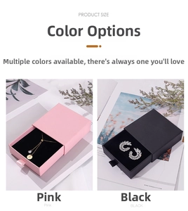 Detail of drawer-style jewelry boxes in pink and black with soft velvet lining
