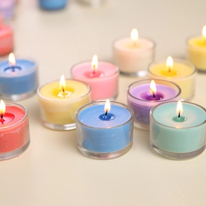Romantic colorful scented glass candles for Valentine's Day in vibrant multiple shades
