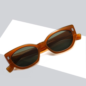 Chic amber cat-eye sunglasses with UV protection and retro transparent acetate frames