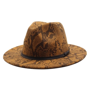 Detail shot of the faux wool snakeskin pattern texture and black ribbon band on the fedora