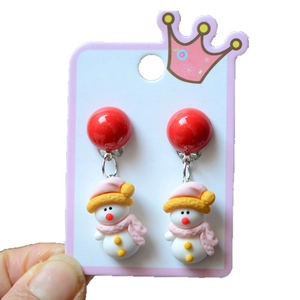 Detail of Christmas snowman earrings with red hooks and cute pink scarves