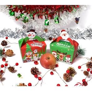 Close-up of red and green Christmas gift boxes with festive snowman and Santa handles