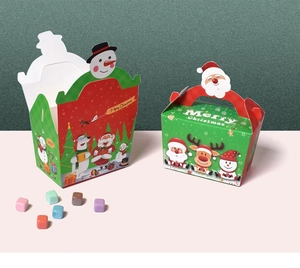 Detail of Santa Claus and snowman themed Christmas gift boxes with creative handles
