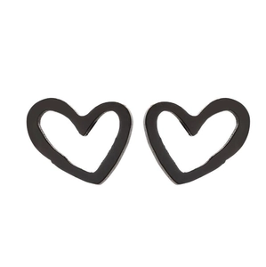 Detailed close-up of pair of minimalist black heart-shaped stainless steel stud earrings