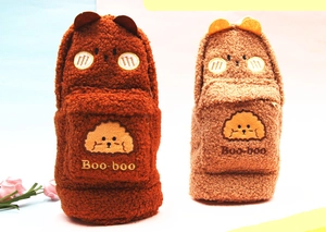 Macro view of plush teddy bear pencil cases with soft sherpa texture and Boo-boo embroidery