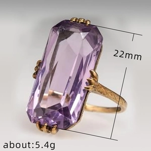 Vintage gold ring with rectangular purple zircon stone and detailed 22mm emerald cut