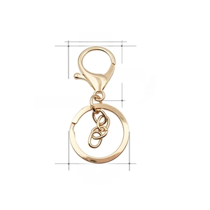 Detailed view of golden metal keychain set with 65mm total length and 30mm ring diameter
