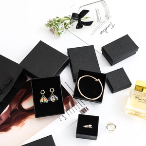 Elegant black textured jewelry gift box set including ring, bracelet and necklace boxes