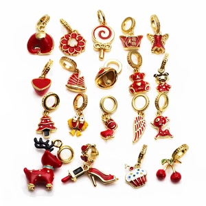 Red and gold enamel beads for DIY bracelets featuring deer and flower patterns