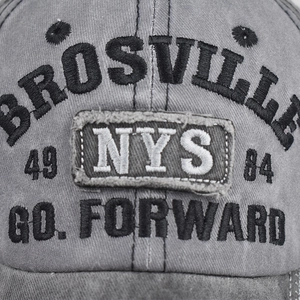 Distressed cotton baseball cap with NYS embroidery and vintage denim texture detail