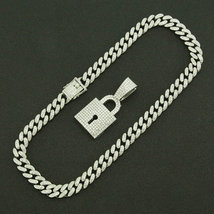 Chunky silver Cuban link necklace with iced out rhinestone padlock pendant and box clasp