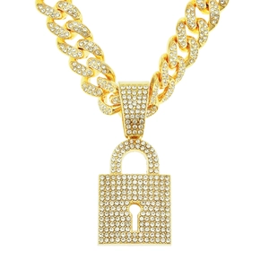 Iced out gold Cuban link chain necklace featuring a creative sparkling diamond lock pendant