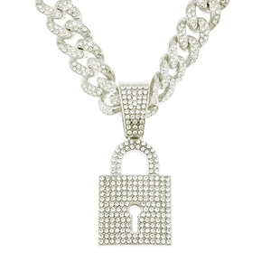 Macro shot of silver hip hop iced out lock pendant with rhinestones on Cuban link chain