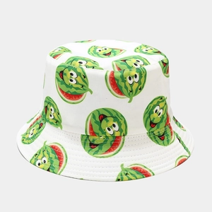 Close-up of white bucket hat with cute cartoon watermelon print for summer sun protection