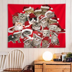 Detail view of festive red Christmas wall tapestry featuring cute cats in Santa hats