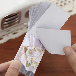 Artistic stationery notebook with floral cake illustrations and blank writing pages