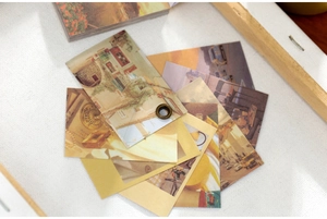 Close-up of vintage aesthetic decorative paper cards with metal eyelets for DIY journaling