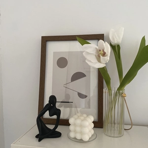 Modern home decor set with abstract sculpture, bubble candle and framed art piece