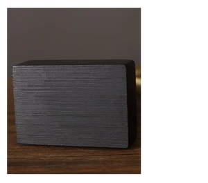 Detail of the stable black rectangular base with a brushed metal texture for decor