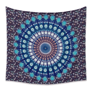 Bohemian mandala wall tapestry with intricate geometric floral patterns in deep blue and teal