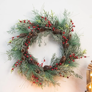 Red berry Christmas wreath with pine cones and needles for front door wall decor