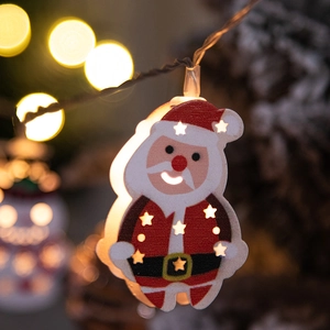 Hanging Santa Claus LED string lights with warm star-shaped cutout glow for Xmas decor