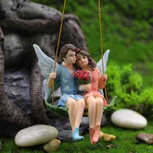 Miniature resin fairy couple ornaments on leaf swing for garden landscape decoration