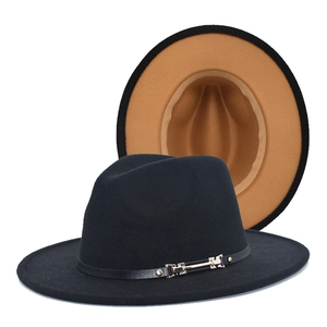Detail of wool fedora hat featuring a decorative leather band with a silver metal buckle