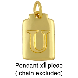 Detailed view of a gold-toned rectangular pendant with an embossed letter U detail