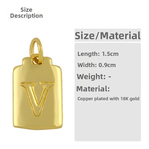 Detail of 18K gold-plated copper rectangle pendant featuring engraved letter V