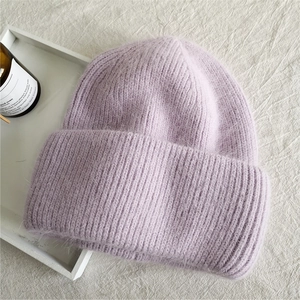 Detailed texture of lavender rabbit fur knit hat with thick double-layer plush material