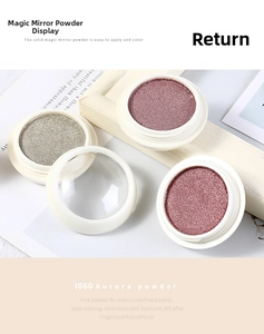 Detailed close-up of metallic silver and pink mirror nail powder with application brush