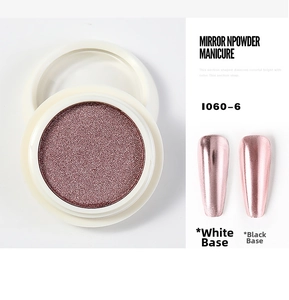 Macro view of rose gold nail mirror powder with metallic chrome effect on black and white base