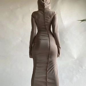 Slim fit long sleeve hooded maxi dress in camel featuring exposed seams and thumbholes