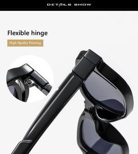 Detail of premium high-gloss black square sunglasses showing flexible hinge and sturdy frame