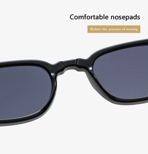 Detail of comfortable integrated nose pads on black square retro sunglasses