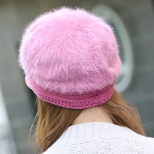 Pink rabbit fur knit beanie for women with pearl floral accents and warm ribbed trim